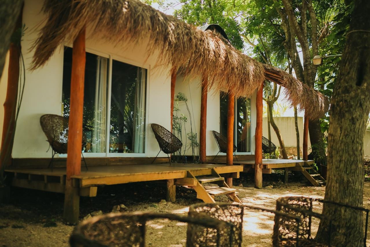 Bungalows de Casa Lua entre la vegetación
