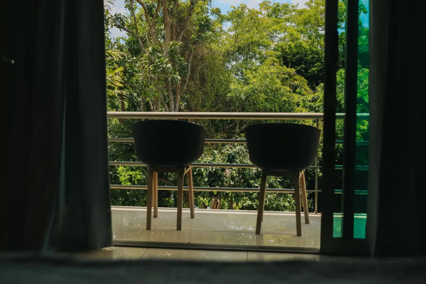 Balcón privado de bungalow doble en Casa Lua